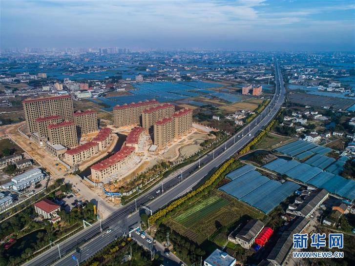 (慶祝改革開放40周年基層行·鄉鎮篇·圖文互動)(2)“中國第一座農民城”溫州龍港正向現代化新生城市跨越