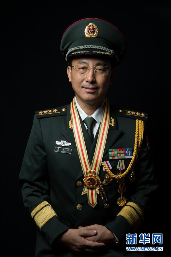 (改革先鋒風采·圖文互動)戰斗英雄韋昌進:甘做鋼鐵長城一塊磚