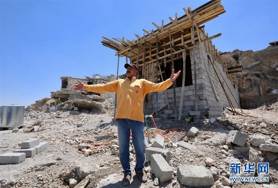 (國際·圖文互動)(5)通訊:中企員工愛心捐款助摩蘇爾老城民眾重燃生活希望