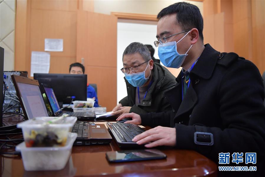 (聚焦疫情防控·圖文互動)(4)他們用堅守筑起一道道防線——記江西戰“疫”一線的基層黨員干部