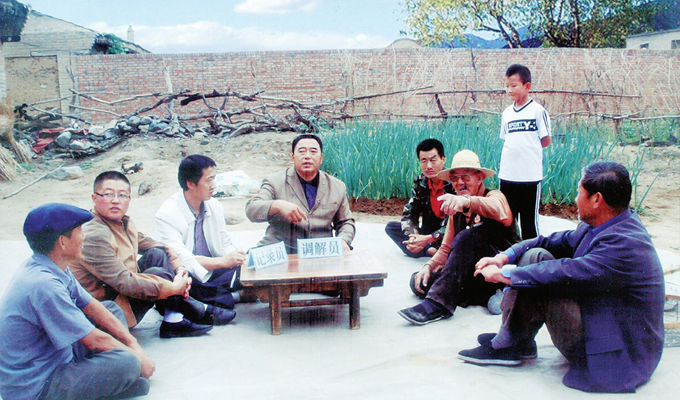 調解&ldquo;家長里短，雞毛蒜皮&rdquo;的小事情是李培斌從事的大事業